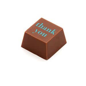 Image of A square shaped milk chocolate, with the message